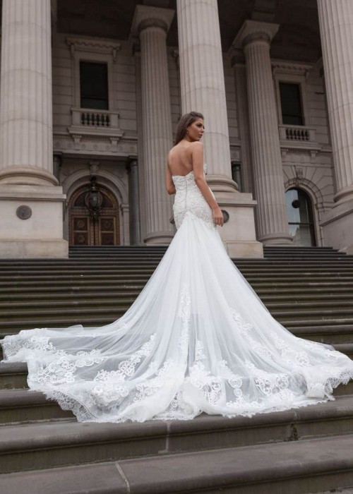 Low V back wedding dress with hand beaded pearls and lace Low V back wedding dress with hand beaded pearls and lace