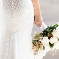 Hand beaded pearl on wedding dress Hand beaded pearl on wedding dress